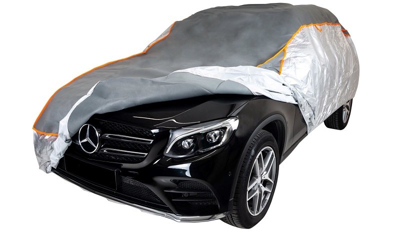 Hail protection cover over Mercedes car